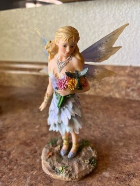 Porcelain Fairy Figurine with Pastel Wings